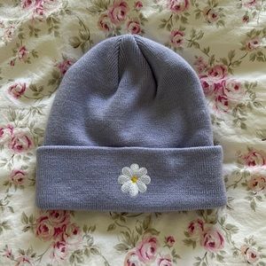 Purple beanie with Daisy